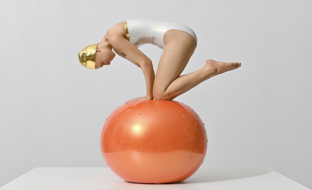 CAROLE A. FEUERMAN, Miniature Quan - Pearl White Suit w/ 24K Gold Leaf Cap, Accents & Tangerine Sphere